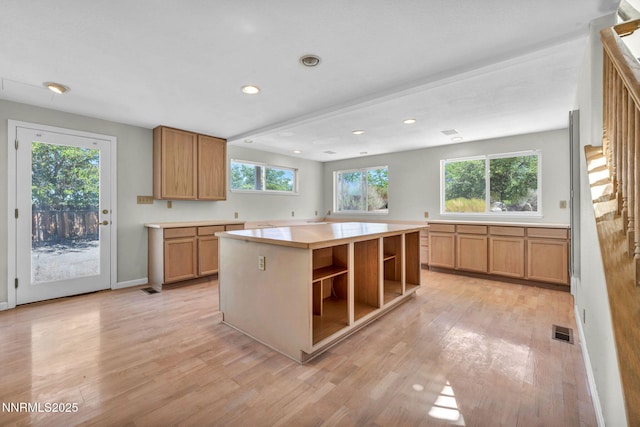 1425 Julie Ct, Reno, NV 89509 - kitchen featuring open shelves, light wood-style flooring, recessed lighting, and light countertops
