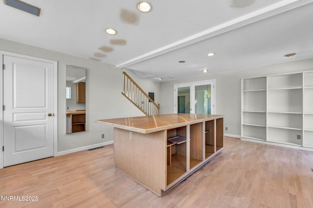 1425 Julie Ct, Reno, NV 89509 - kitchen with light wood-style flooring, recessed lighting, open shelves, and light countertops