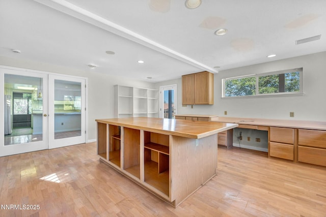 1425 Julie Ct, Reno, NV 89509 - kitchen with open shelves, light wood-style flooring, recessed lighting, butcher block counters, and a kitchen island