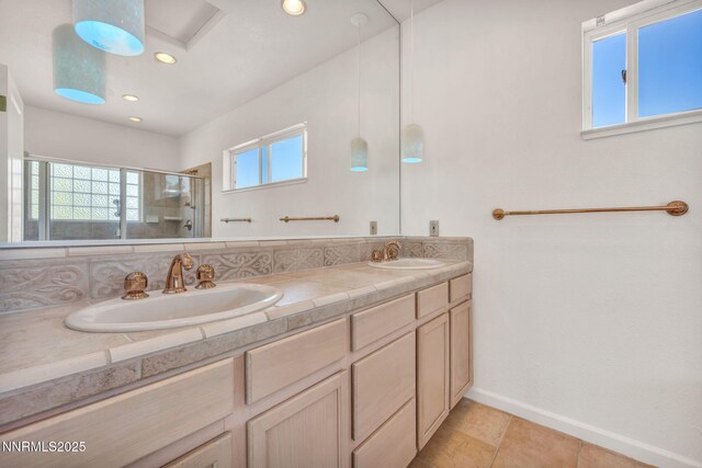 1425 Julie Ct, Reno, NV 89509 - full bathroom with double vanity, a shower stall, recessed lighting, and tile patterned floors