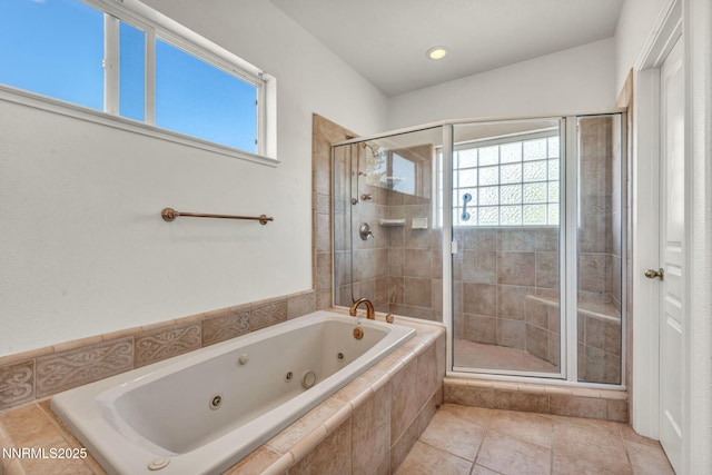 1425 Julie Ct, Reno, NV 89509 - bathroom with a tub with jets, a stall shower, plenty of natural light, and recessed lighting