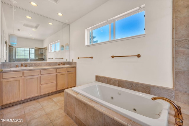 1425 Julie Ct, Reno, NV 89509 - bathroom with a shower stall, a whirlpool tub, double vanity, recessed lighting, and tile patterned flooring