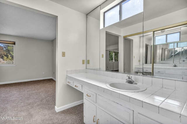 1425 Julie Ct, Reno, NV 89509 - bathroom with healthy amount of natural light and vanity