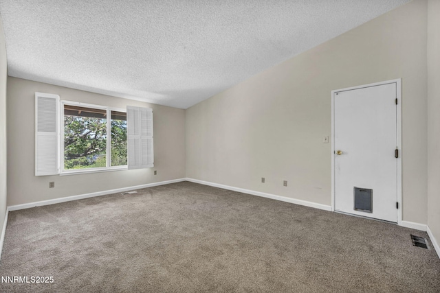 1425 Julie Ct, Reno, NV 89509 - carpeted spare room featuring a textured ceiling and baseboards