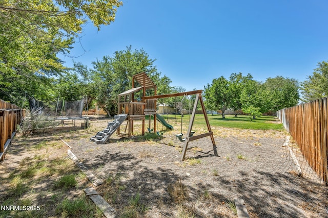 4210 Magnolia Rd, Fallon, NV 89406 - view of playground with a trampoline and a fenced backyard