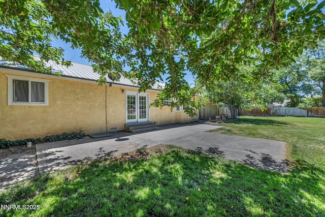4210 Magnolia Rd, Fallon, NV 89406 - fenced yard featuring a patio area, entry steps, and french doors