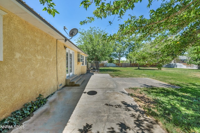4210 Magnolia Rd, Fallon, NV 89406 - fenced backyard with a patio