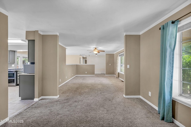 4210 Magnolia Rd, Fallon, NV 89406 - unfurnished living room with light colored carpet, ceiling fan, and crown molding