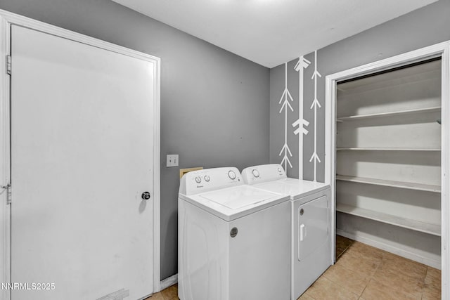 4210 Magnolia Rd, Fallon, NV 89406 - washroom with independent washer and dryer and light tile patterned flooring