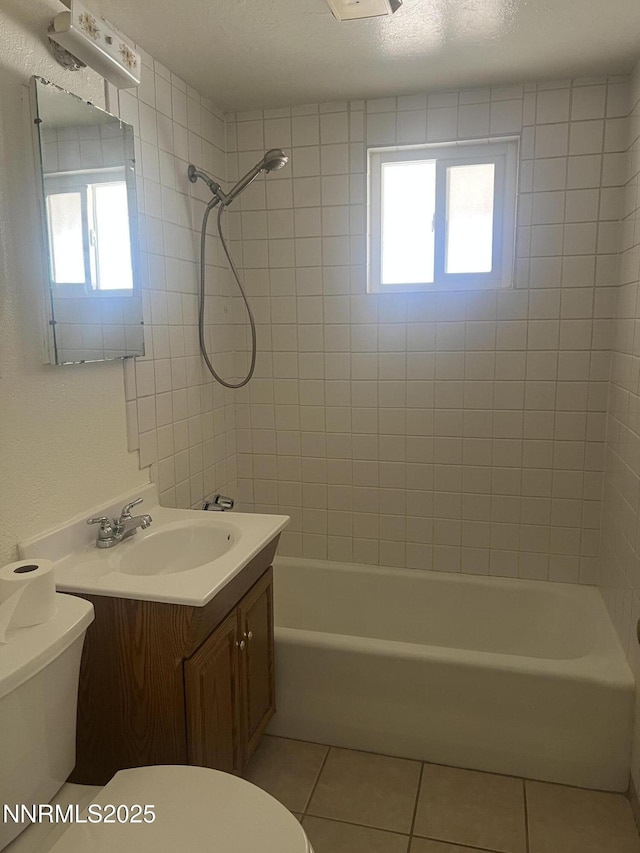 385 Smithridge Park Unit 3Ut4Lt, Reno, NV 89502 - bathroom with tile patterned flooring, vanity, plenty of natural light, and washtub / shower combination