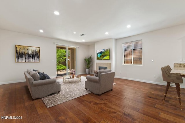 1460 Waterloo Dr, Reno, NV 89509 - living room featuring hardwood / wood-style floors, recessed lighting, and a tile fireplace