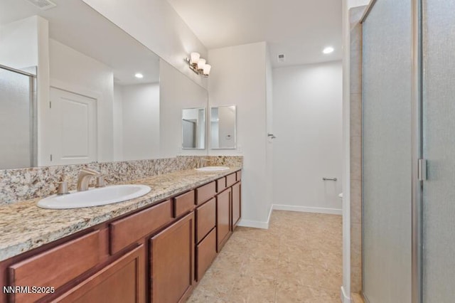 1460 Waterloo Dr, Reno, NV 89509 - full bath with double vanity, a stall shower, and recessed lighting