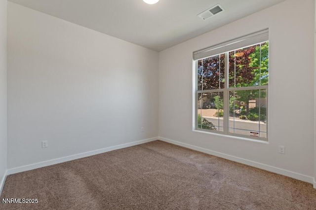 1460 Waterloo Dr, Reno, NV 89509 - carpeted spare room featuring baseboards