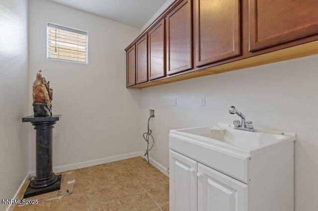 1460 Waterloo Dr, Reno, NV 89509 - washroom featuring cabinet space and washer hookup