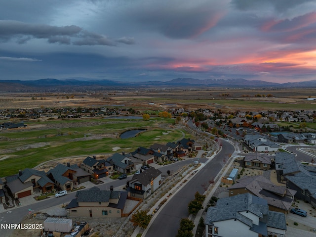 2912 Portrush Dr, Genoa, NV 89411 - aerial view at dusk of golf course view, a residential view, and a water and mountain view