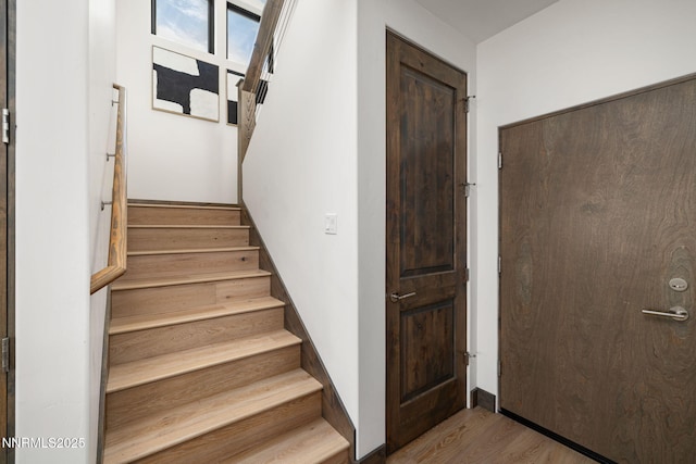 2912 Portrush Dr, Genoa, NV 89411 - stairs featuring wood finished floors