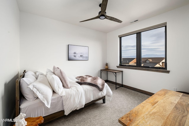 2912 Portrush Dr, Genoa, NV 89411 - carpeted bedroom with baseboards and a ceiling fan