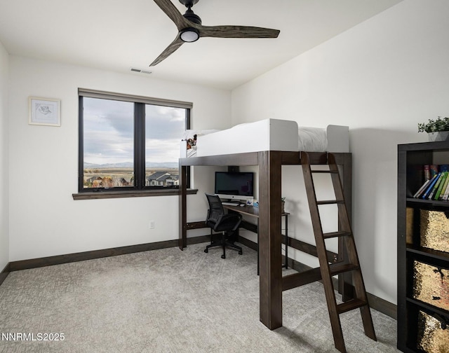 2912 Portrush Dr, Genoa, NV 89411 - carpeted bedroom featuring an office area and a ceiling fan