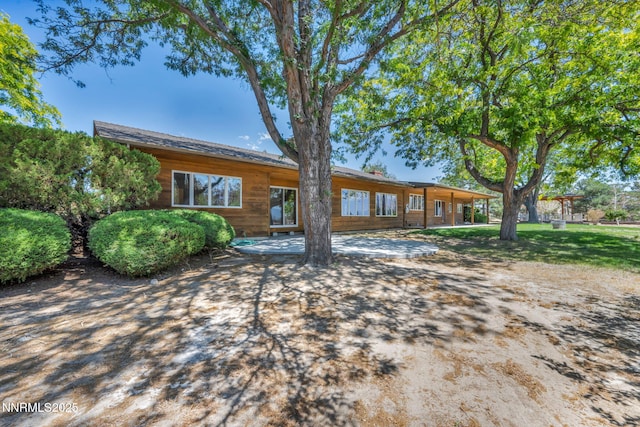 1405 Primrose Ln, Minden, NV 89423 - view of front facade with a patio area