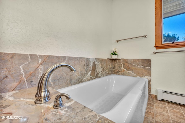 1405 Primrose Ln, Minden, NV 89423 - bathroom featuring baseboard heating and a bath