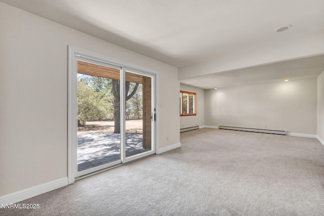 1405 Primrose Ln, Minden, NV 89423 - empty room featuring a baseboard radiator, a baseboard heating unit, and carpet floors