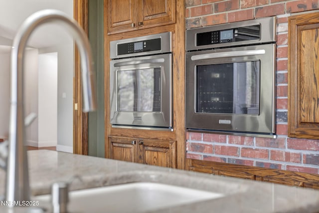 1405 Primrose Ln, Minden, NV 89423 - kitchen view of stainless steel oven and brown cabinetry