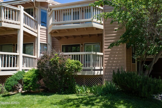 2875 Idlewild Dr Apt 5, Reno, NV 89509 - back of house featuring a balcony
