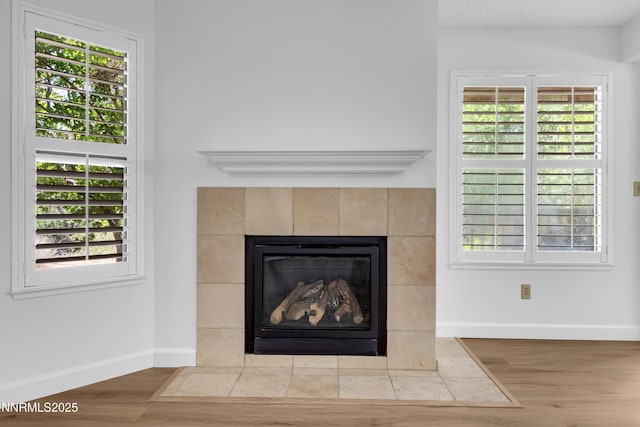 2875 Idlewild Dr Apt 5, Reno, NV 89509 - detailed view of wood finished floors and a tiled fireplace