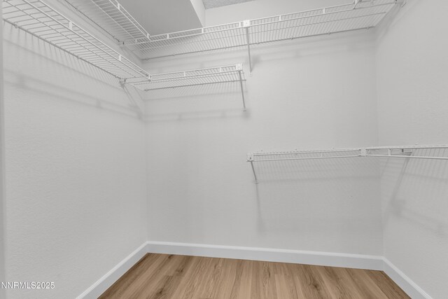 2875 Idlewild Dr Apt 5, Reno, NV 89509 - spacious closet featuring wood finished floors