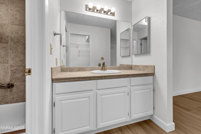 2875 Idlewild Dr Apt 5, Reno, NV 89509 - full bath with vanity and wood finished floors