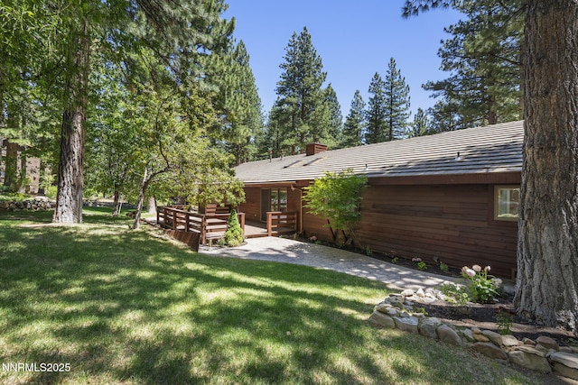 1705 Blue Spruce Rd, Reno, NV 89511 - view of grassy yard featuring a patio area