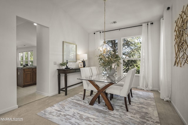 4811 Elkcreek Trl, Reno, NV 89519 - dining room featuring light carpet and a chandelier