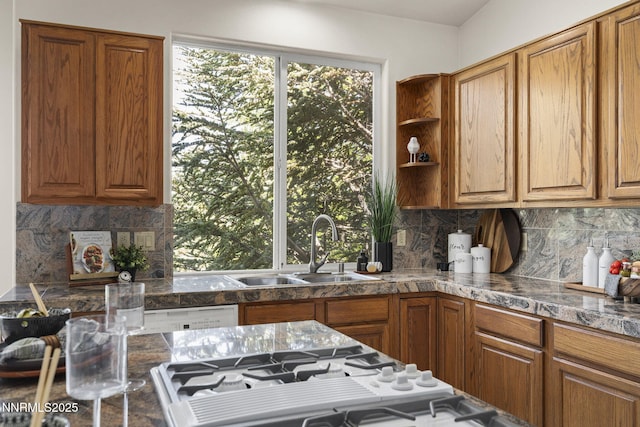 4811 Elkcreek Trl, Reno, NV 89519 - kitchen featuring tile counters, backsplash, and brown cabinetry