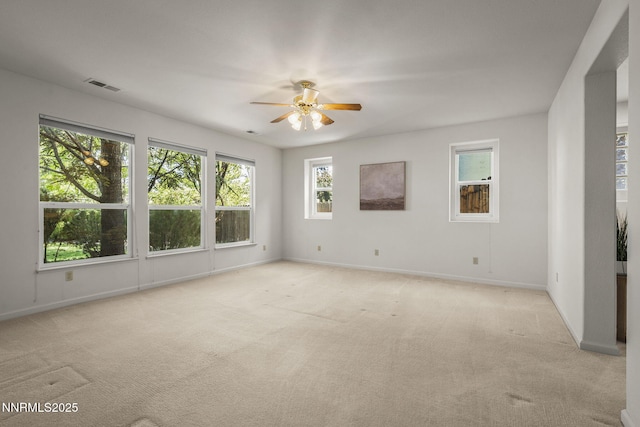 4811 Elkcreek Trl, Reno, NV 89519 - spare room featuring ceiling fan and light carpet