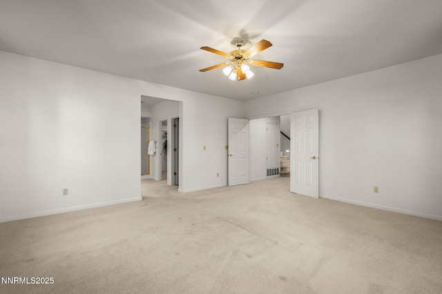 4811 Elkcreek Trl, Reno, NV 89519 - unfurnished bedroom featuring light colored carpet and ceiling fan