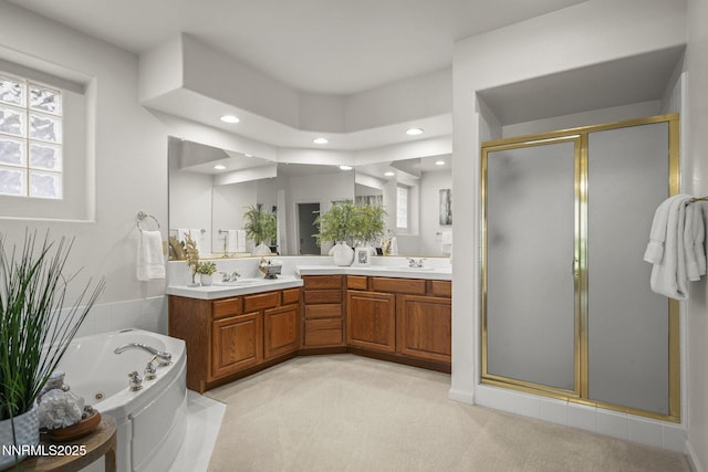 4811 Elkcreek Trl, Reno, NV 89519 - bathroom featuring double vanity, a shower stall, a jetted tub, and recessed lighting