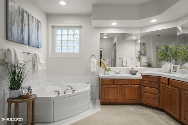 4811 Elkcreek Trl, Reno, NV 89519 - bathroom with a whirlpool tub, vanity, and recessed lighting