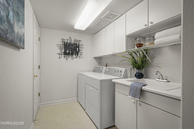 4811 Elkcreek Trl, Reno, NV 89519 - washroom featuring washing machine and dryer, cabinet space, and light flooring