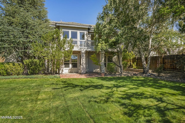 4811 Elkcreek Trl, Reno, NV 89519 - view of front of home with stucco siding, a tile roof, and a patio area