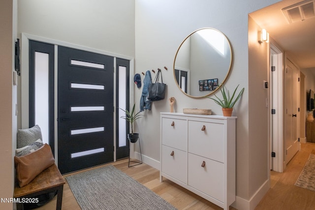 3390 Thornhill Dr, Reno, NV 89509 - entryway featuring light wood finished floors and baseboards