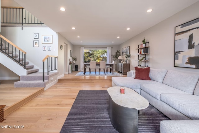 3390 Thornhill Dr, Reno, NV 89509 - living room with recessed lighting, light wood-style floors, and stairway