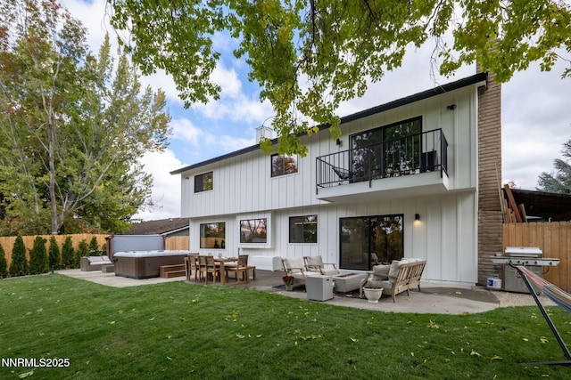 3390 Thornhill Dr, Reno, NV 89509 - back of property with a balcony, an outdoor living space, and a chimney