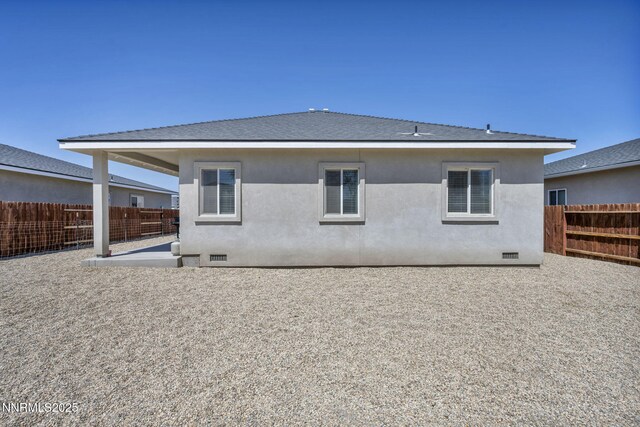 776 Great Basin Ln, Fallon, NV 89406 - rear view of house featuring crawl space, a fenced backyard, a patio, and stucco siding