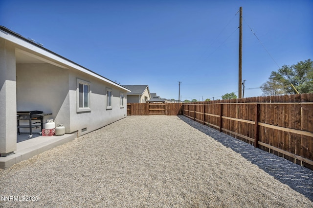 776 Great Basin Ln, Fallon, NV 89406 - fenced backyard featuring a patio