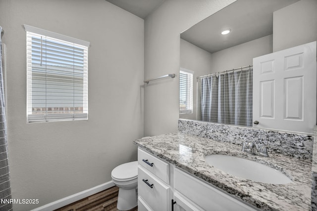 776 Great Basin Ln, Fallon, NV 89406 - full bath with wood finished floors, vanity, and curtained shower