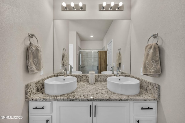 776 Great Basin Ln, Fallon, NV 89406 - bathroom with a stall shower and double vanity