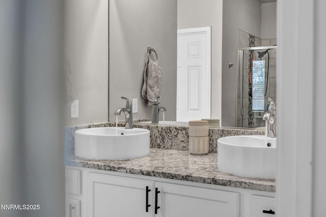 776 Great Basin Ln, Fallon, NV 89406 - bathroom with double vanity and a stall shower