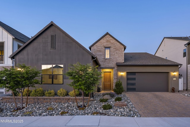 6122 S Pleasant Oak Trl, Reno, NV 89511 - view of front of home featuring a garage and decorative driveway