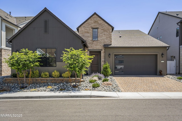 6122 S Pleasant Oak Trl, Reno, NV 89511 - view of front of home featuring a garage and decorative driveway