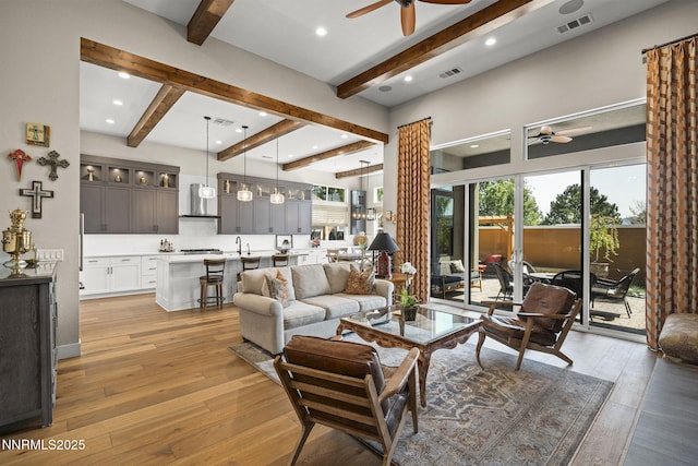 6122 S Pleasant Oak Trl, Reno, NV 89511 - living area with ceiling fan, beam ceiling, light wood-style floors, and recessed lighting